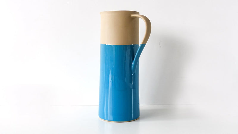 tall slip cast porcelain pitcher or vase