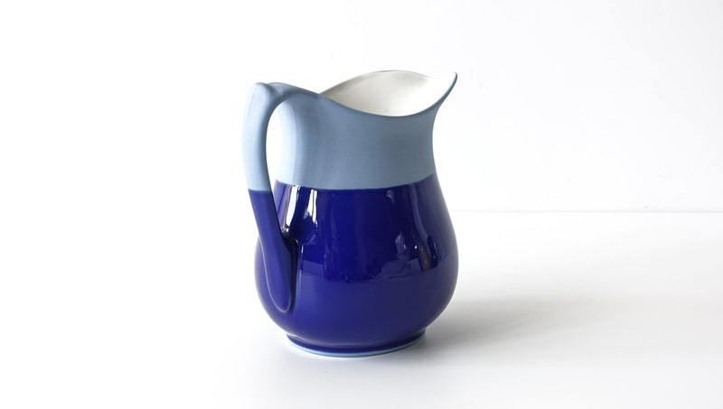 classic curvy slip cast royal navy blue glazed porcelain jug